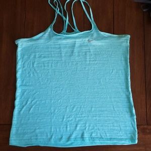 Turquoise Nike drifit tank.